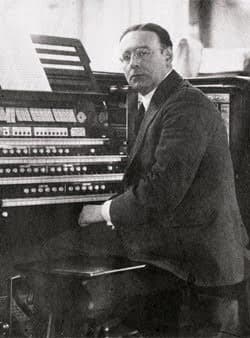 Portrait of Healey Willan seated at the organ, Canada's celebrated composer and organist (1880-1968)
