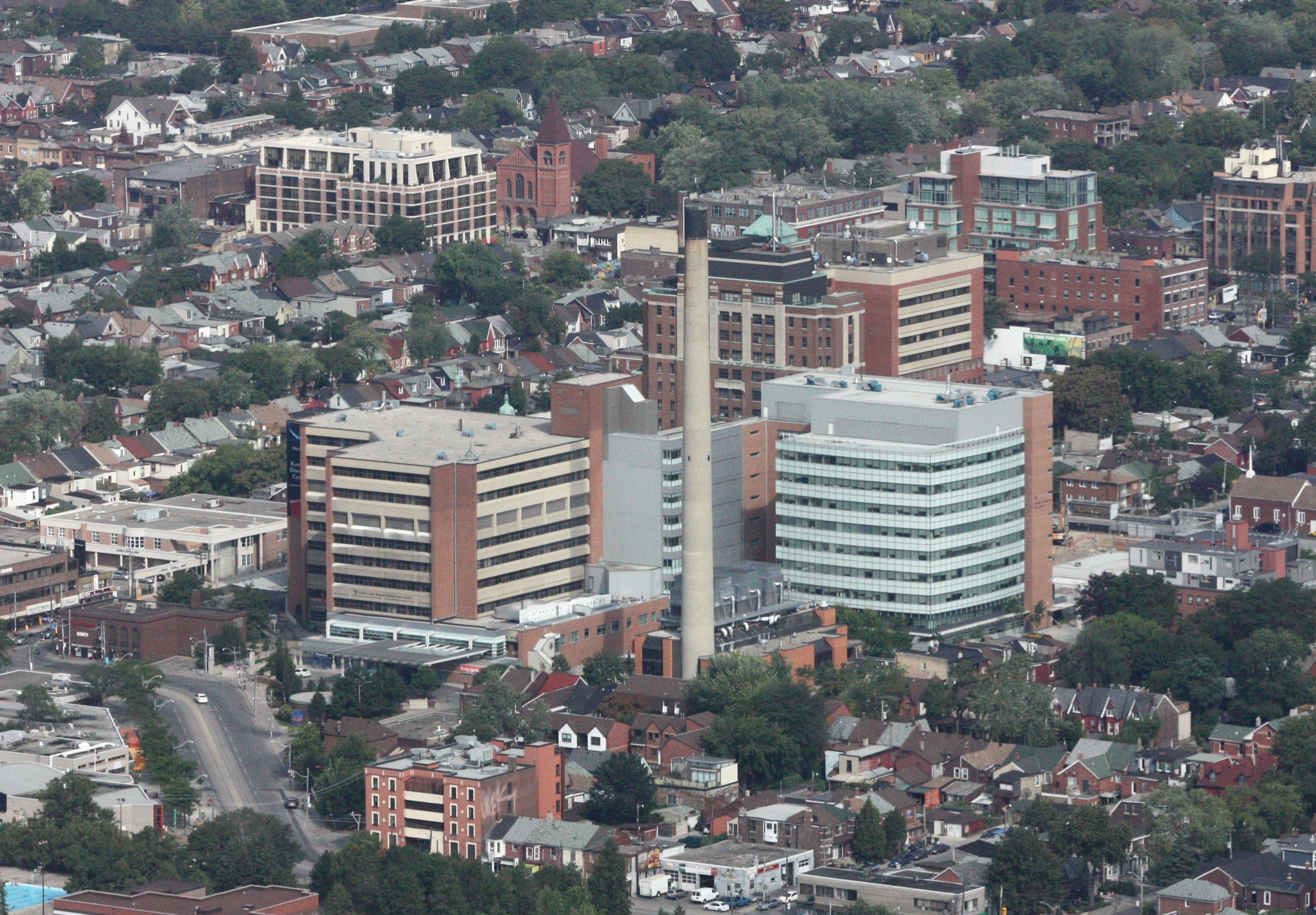 Aerial view of Toronto Western Hospital complex from the CN Tower, showing the full scale of the medical campus at Bathurst and Dundas
