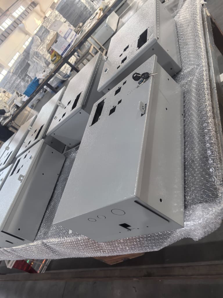Multiple painted metal enclosures