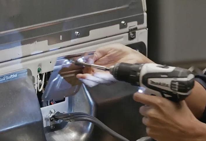 Opening dryer access panel