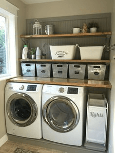 Raised side by side washer and dryer setup