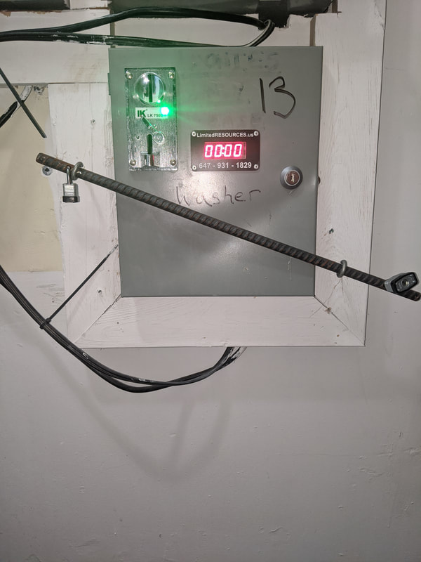 Coin box with cable security system