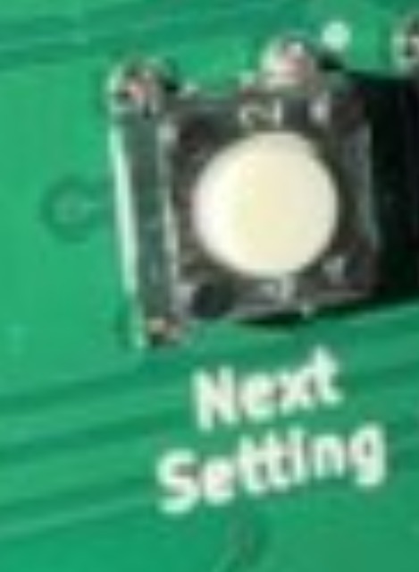 Next Setting button on the timer circuit board