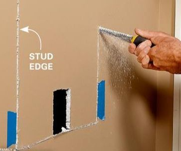 Construction process showing wall stud placement and opening preparation