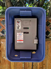 Waterproof timer box installation with protective housing